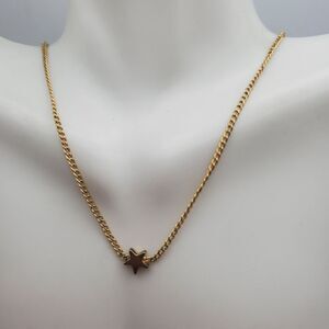 Single shooting star gold toned necklace‎